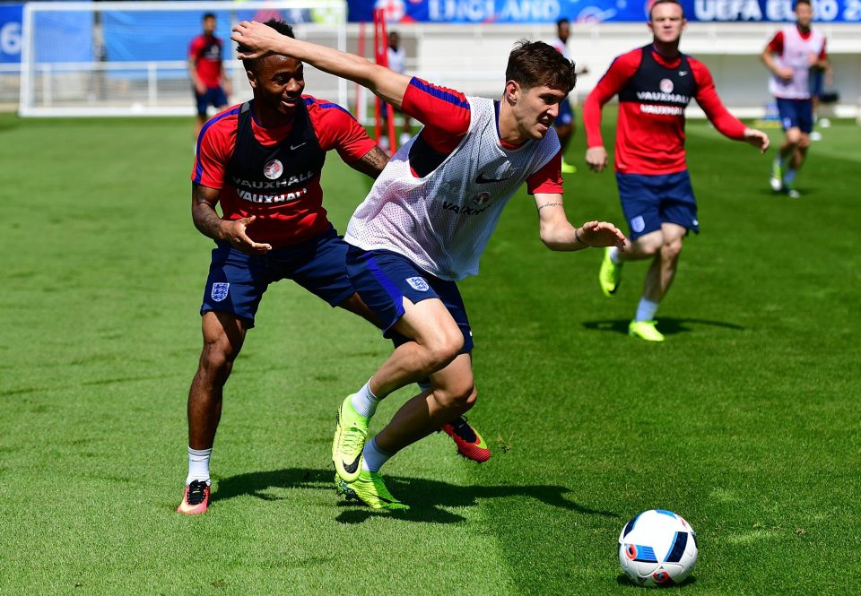Big-money target John Stones fends off Raheem Sterling in England training 