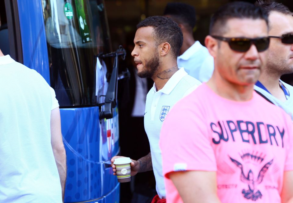 Defender Ryan Bertrand joins his teammates leaving the England hotel