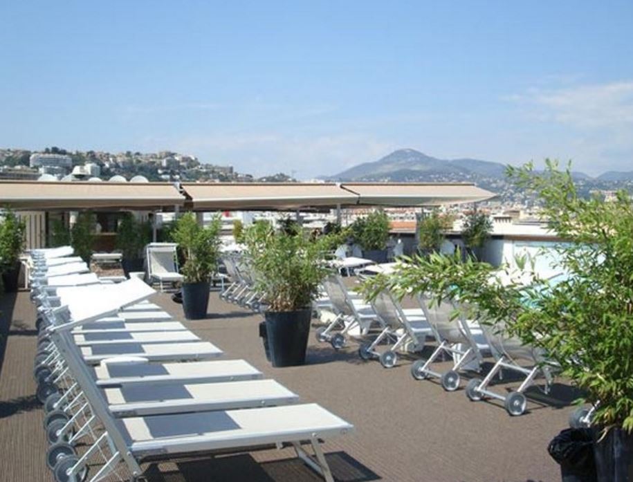 England players held a boozy inquest at the rooftop bar of the AC Hotel in Nice