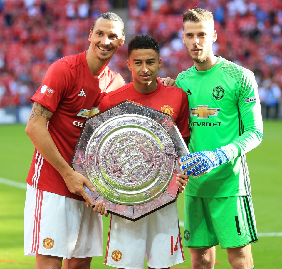 Ibrahimovic, Jesse Lingard and keeper David De Gea celebrate winning the Community Shield