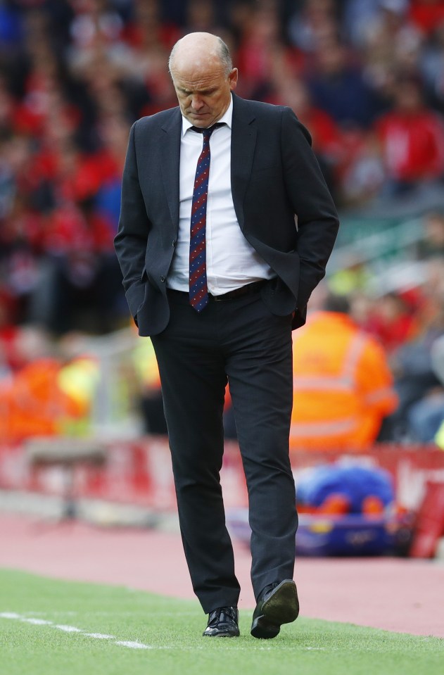 Phelan the pressure. Hull Boss Mike Phelan away as Tigers mauled at Anfield