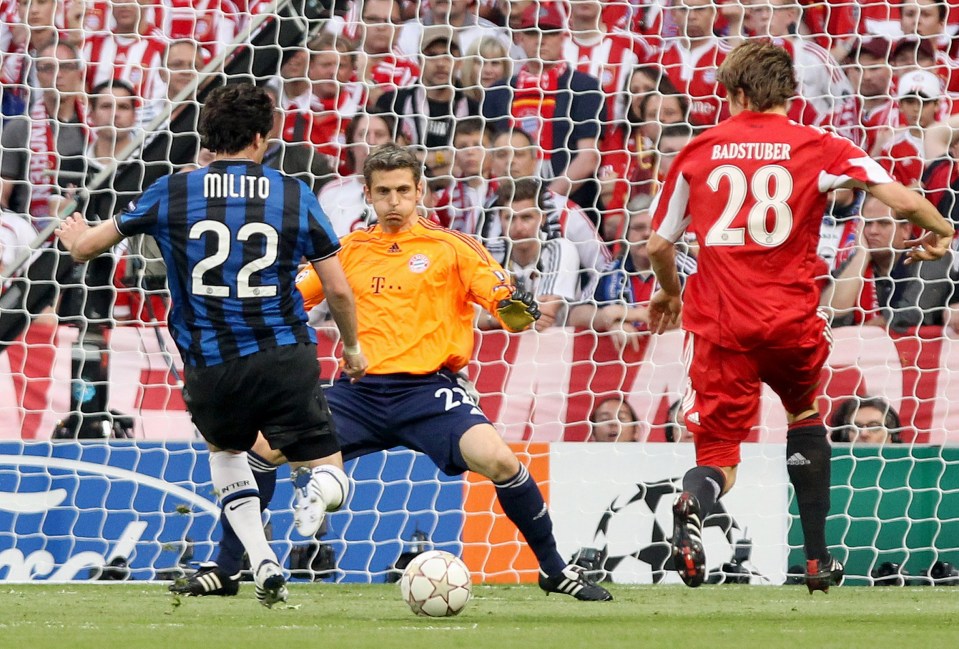 Inter Milan's Diego Alberto Milito from Argentina scores his goal passed Bayern Munich's Hans -Jorg Butt during the Champions League final soccer match at the Santiago Bernabeu stadium in Madrid, Spain, Saturday May 22, 2010. (AP Photo/Andres Kudacki)