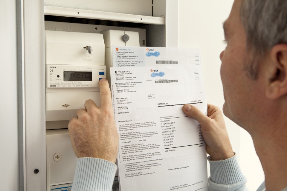 Man checking electricity bill