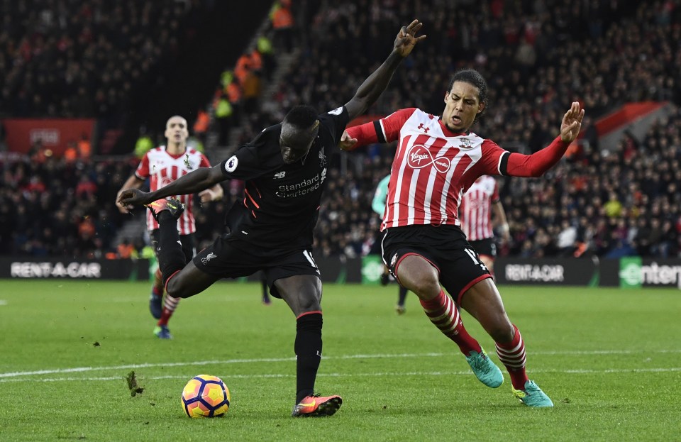 Liverpool's Sadio Mane in action with Southampton's Virgil van Dijk