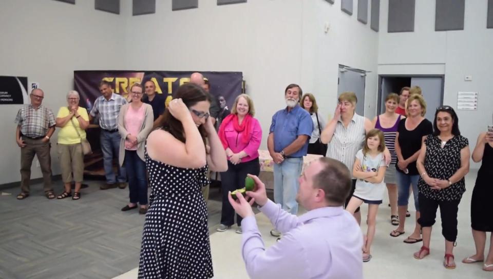 Scott Brown uses an avocado to hide the engagement ring for girlfriend Becky