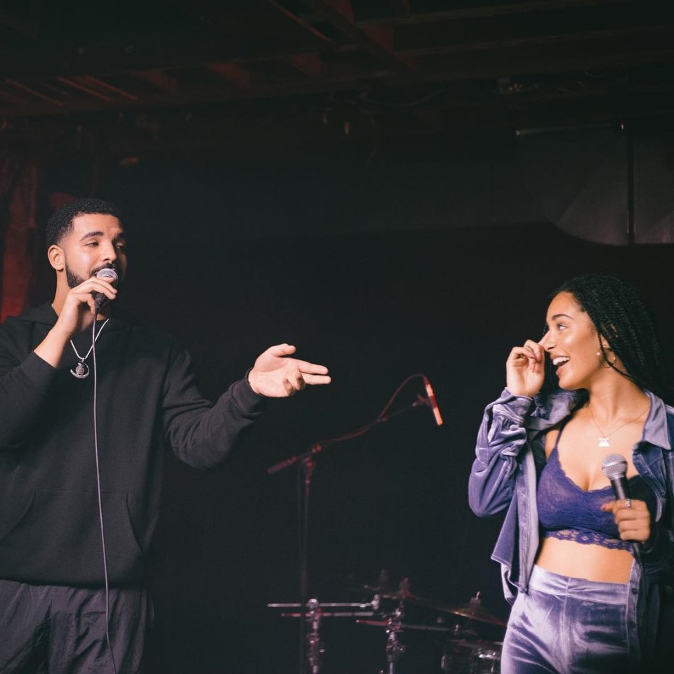 Drake performing with Jorja Smith