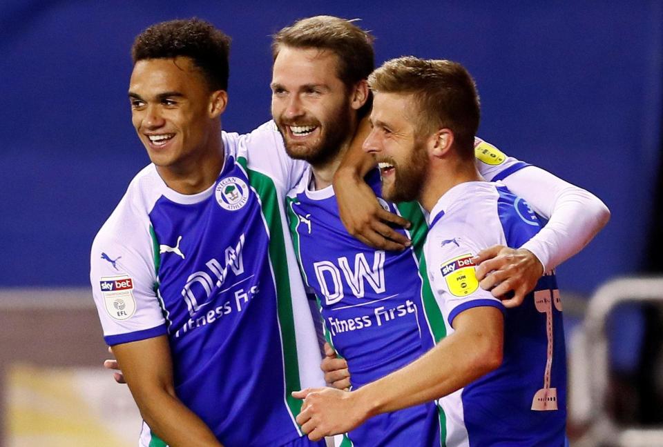  Former Manchester United midfielder Powell reacts after guiding his header into the bottom corner