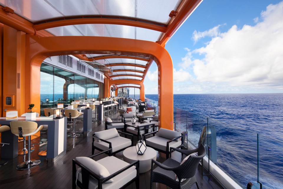  The cruise ship's magic carpet suspends guests above the ocean