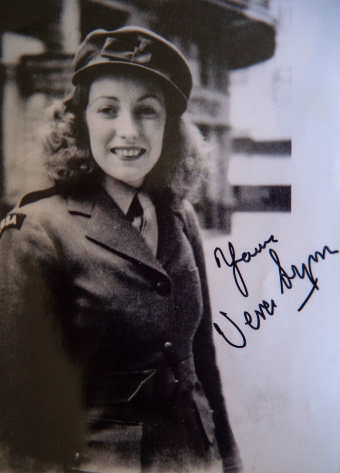 Former Marine Commando Joe Corless a landing craft skipper landed British soldiers on Sword beach on D Day with a photo of Dame Vera