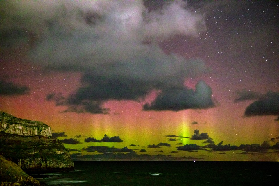 The Aurora Borealis making a rare appearance off the coast of Llandudno, North Wales, in the early hours