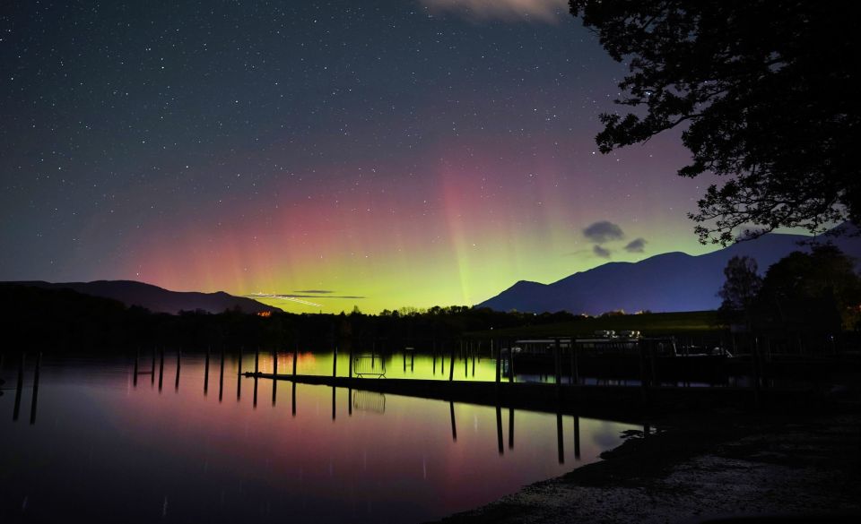 A spectacular display of the Northern Lights seen over Derwentwater, near Keswick in the Lake District,