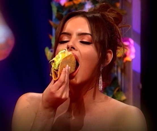 Maura Higgins seductively eats a taco