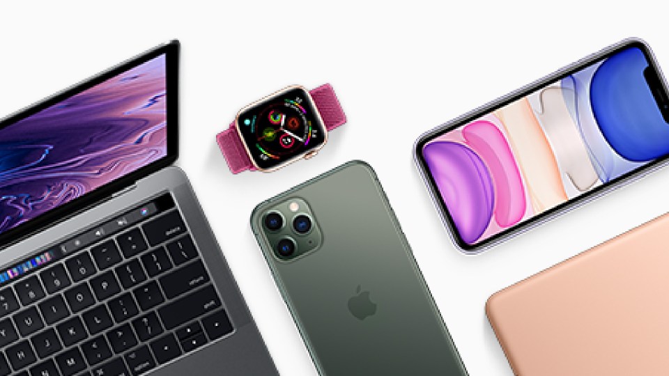 Apple laptop, iPhone, Apple Watch, and iPad.