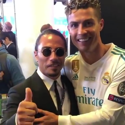 Salt Bae posing with Cristiano Ronaldo after the 2018 Champions League
