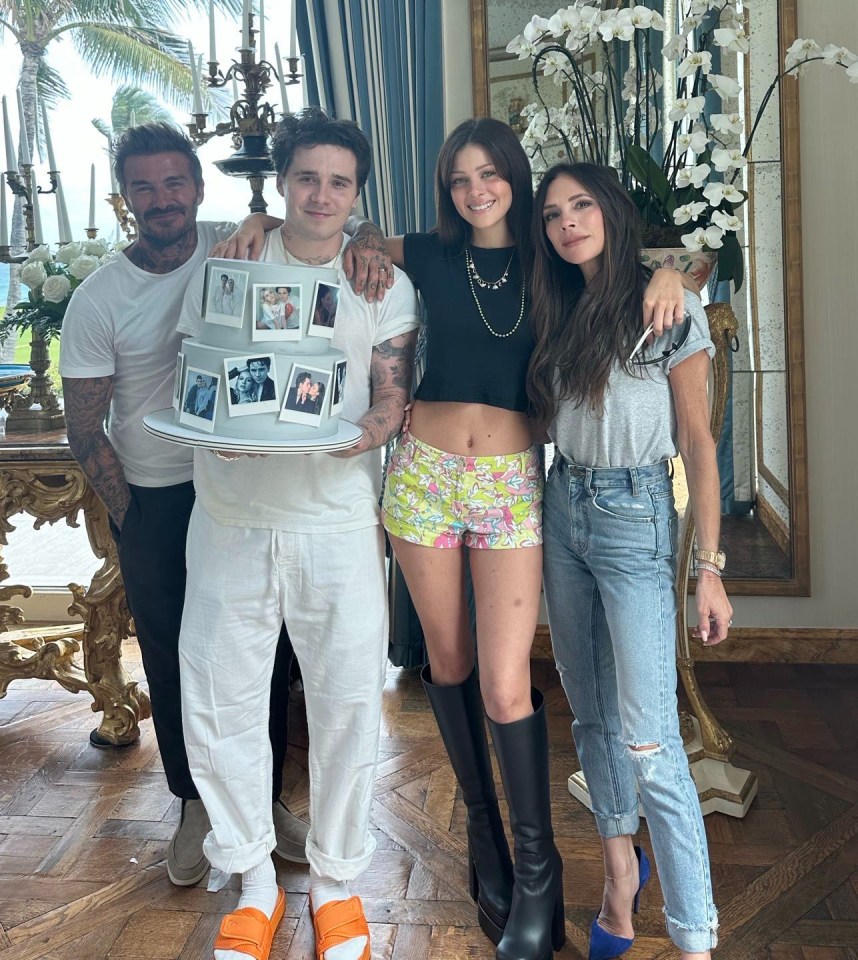Brooklyn and Victoria pictured with David and Victoria last month to celebrate their first wedding anniversary