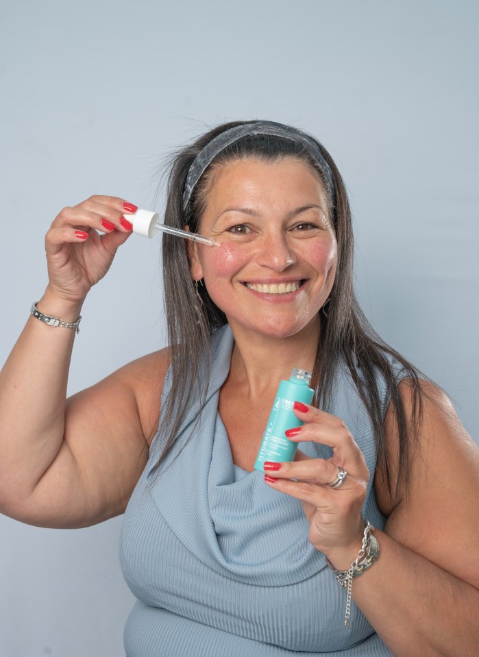 Sun Features - Fabulous Inbaal with the Non-Stop Dew Drops Ultra Lightweight Facial Oil. Inbaal Honigman from Meltham, West Yorkshire, tests out the M&S Fresh Elements skin range. Photograph by Richard Walker