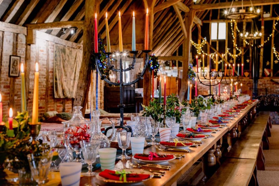 The quirky barn conversion, beautifully lit up at Christmas, is in a walled garden on 500 acres of farmland, including woodlands, meadows and ponds, in Lavenham, Suffolk