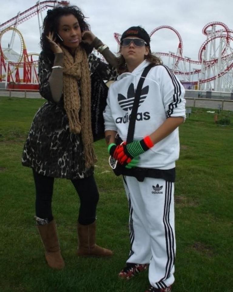 He contrasted their current stylish look with a hilarious snap showing the pair at a theme park