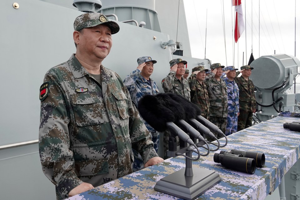 Xi Jinping with the Chinese People’s Liberation Army's Navy fleet in the South China Sea