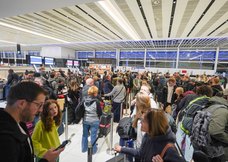 Passengers waited in huge queues at Manchester Airport on Good Friday