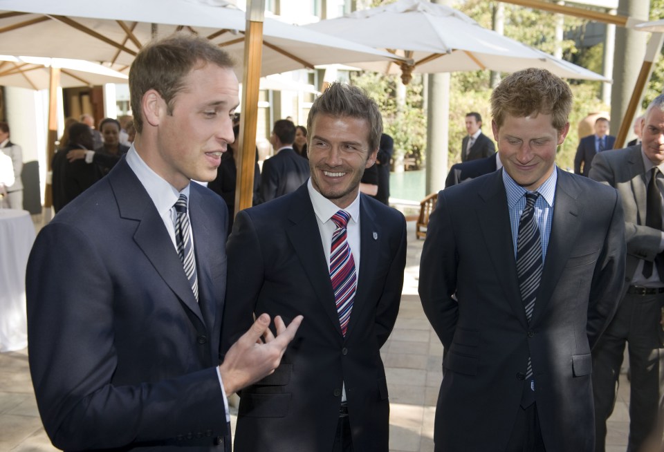 three men in suits and ties are standing next to each other