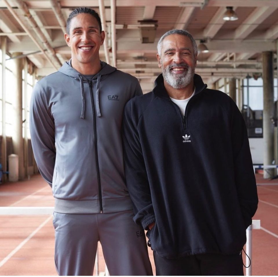 The dad-of-five pictured with son Elliot, who also competes in decathlons