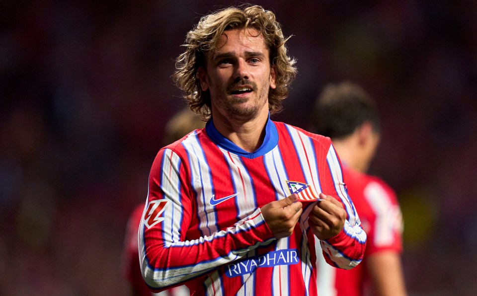 a soccer player wearing a red white and blue jersey with riyadh air written on it