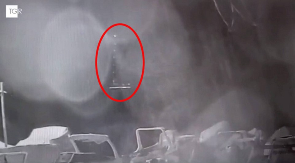 a black and white photo with a red circle that says tgr