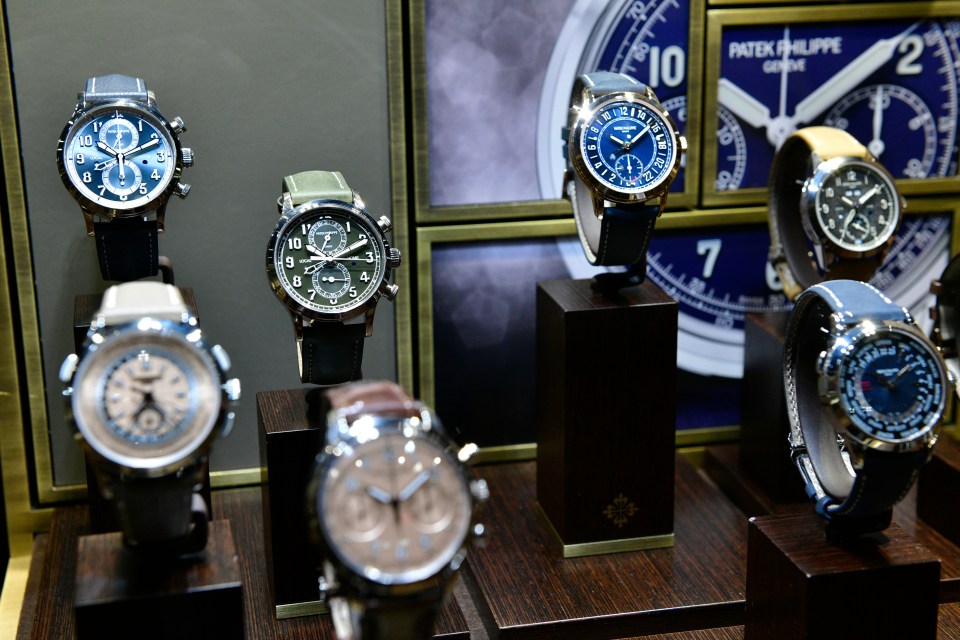 several patek philippe watches are on display in a store