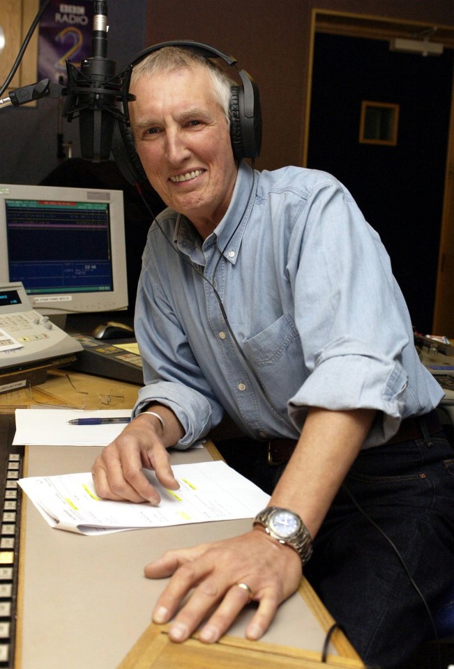 BBC Radio 2 DJ Johnnie Walker in a studio.