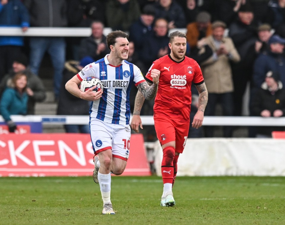 Hartlepool United's Callum Cooke celebrates a goal.
