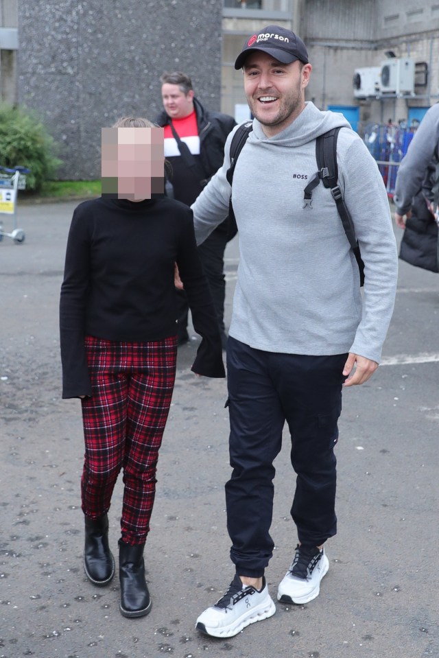Alan Halsall arriving back in the UK with his daughter.
