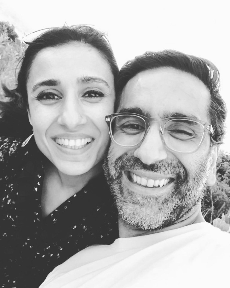 A smiling married couple.