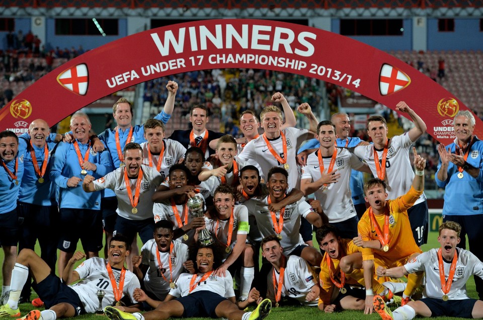 England's under-17 team celebrates winning the 2014 UEFA European Championship.