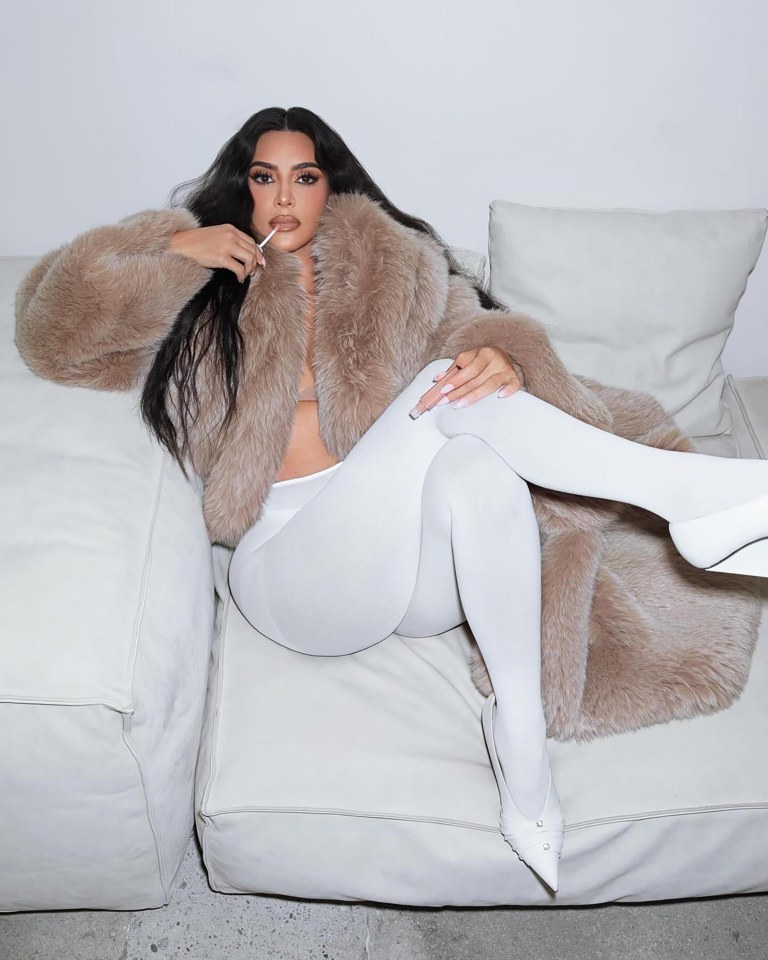 Kim Kardashian wearing the SKKN Holiday Collection.