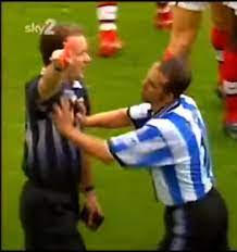 Di Canio pushing referee Alcock.