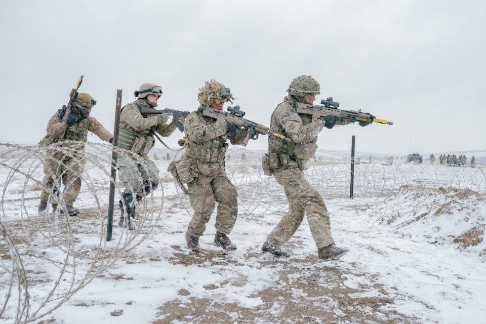 British soldiers conducting an assault during a NATO exercise in Romania.
