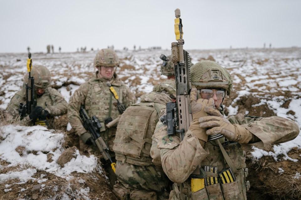 British soldier reloading his gun during NATO Allied Reaction Force (ARF) training in Romania.