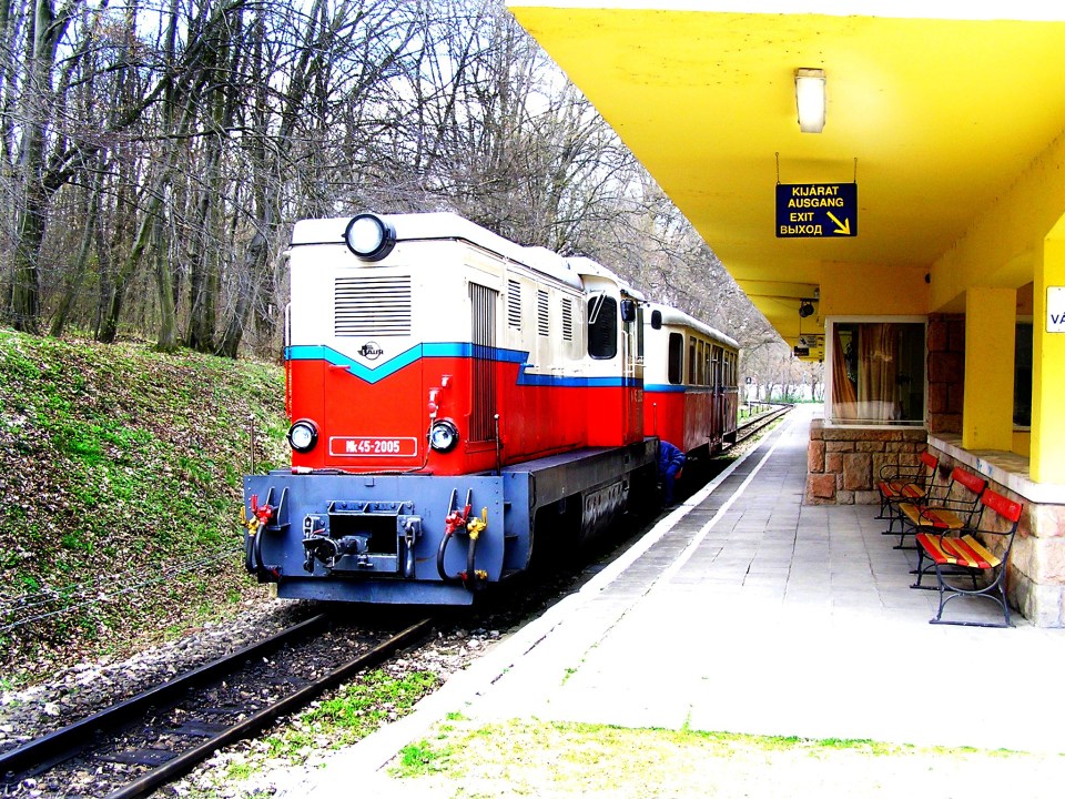 Children's railway train at a station.