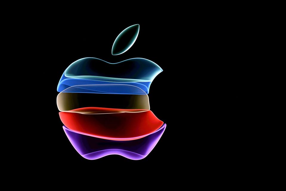 Layered Apple logo in multicolored translucent sections.
