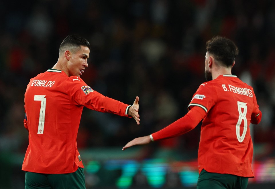 Cristiano Ronaldo and Bruno Fernandes celebrating a goal.