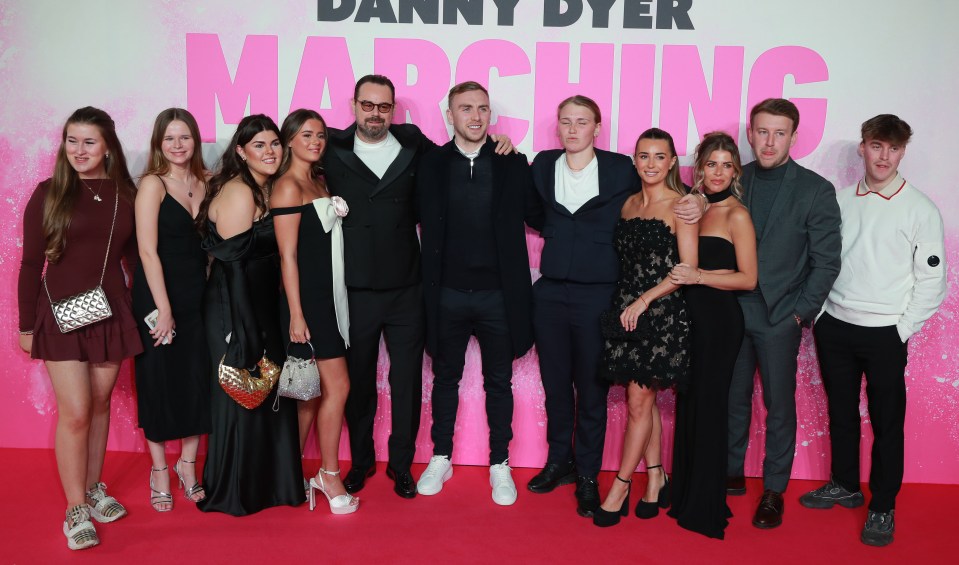 Group photo of celebrities at the premiere of *Marching Powder*.