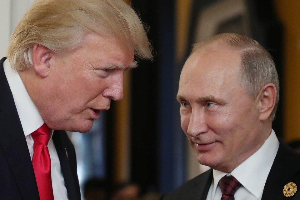Donald Trump and Vladimir Putin in conversation.