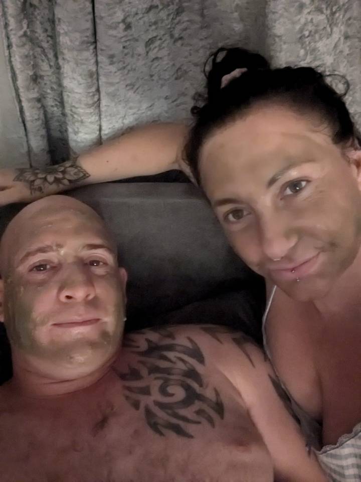 Couple with face masks.