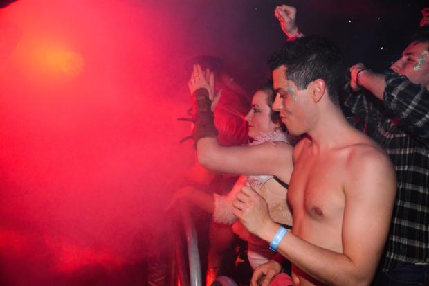 Revellers partying at a music festival.