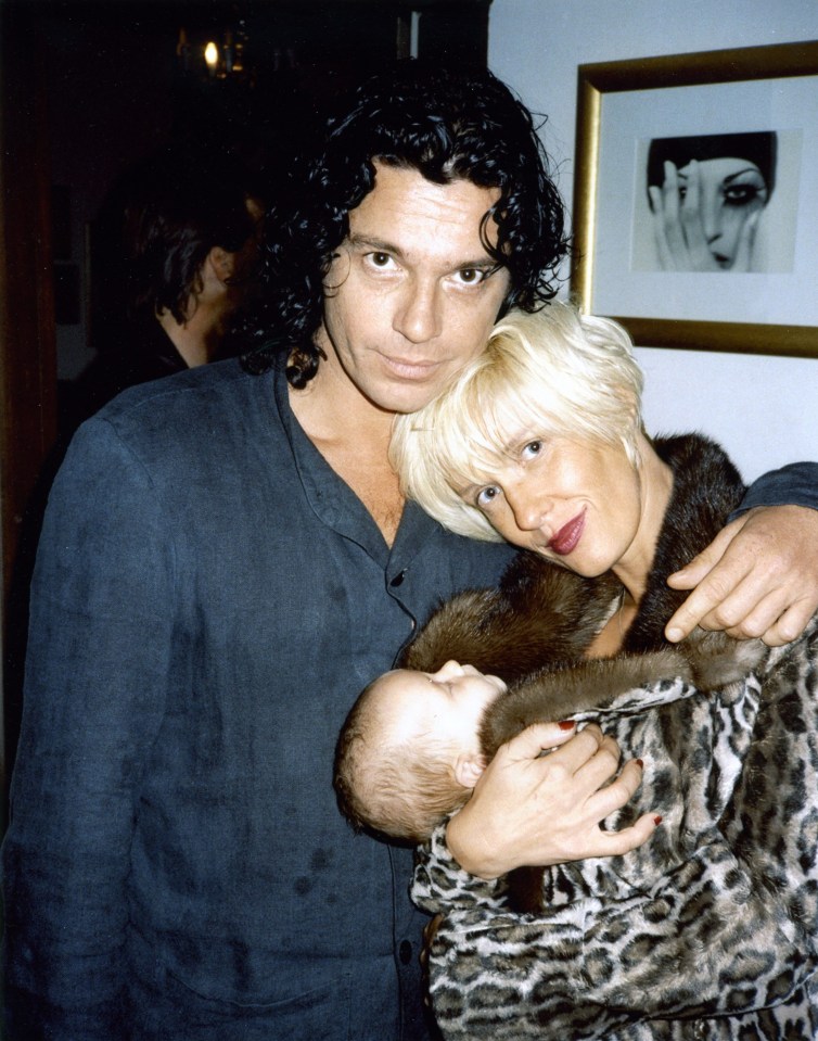 Michael Hutchence, Tiger Lily, and Paula Yates at a private event.