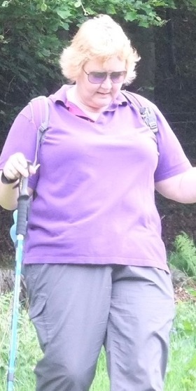 Before and after photos of a woman's weight loss.