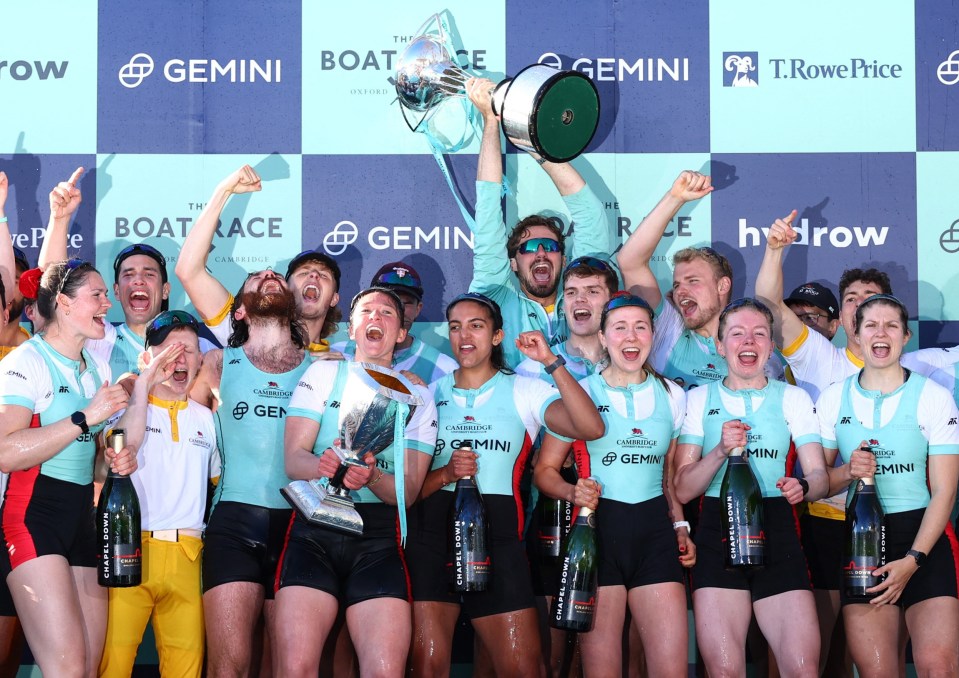 Rowing - The University Boat Race - Putney, London, Britain - March 30, 2024 Cambridge men's and women's teams celebrate on the podium with the trophies after winning both races Action Images via Reuters/Andrew Boyers