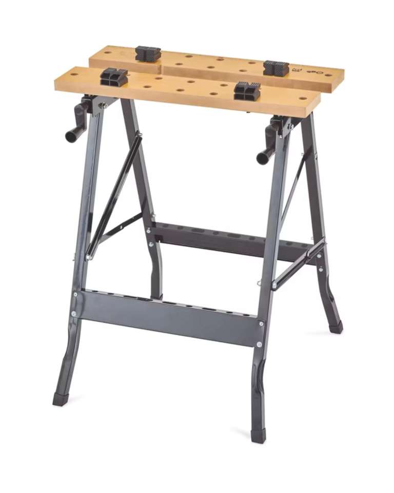 Work bench with black metal legs and wooden top.