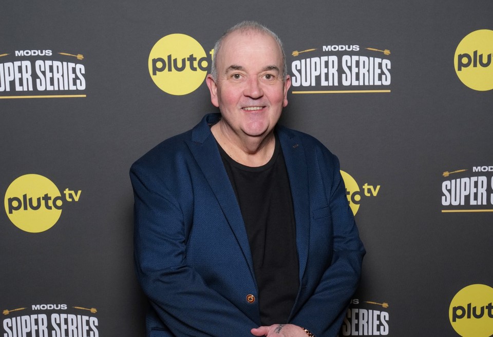 Phil Taylor at a Pluto TV and Modus Super Series darts event.